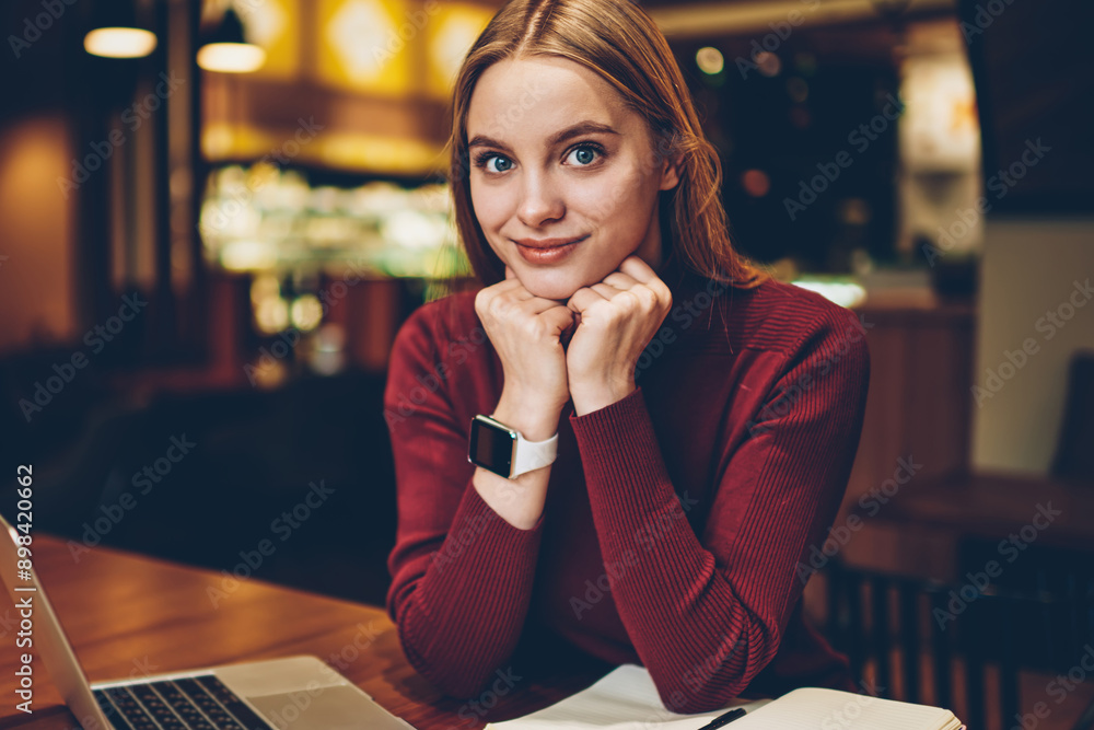 Poster happy female student looking at camera after planning time for course work in textbook, portrait of 