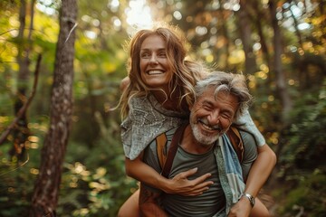 Fototapeta premium An elderly husband gives his wife a piggyback ride during outdoor exercise, symbolizing their active lifestyle and strong bond. This image captures the joy and love shared between the senior couple as