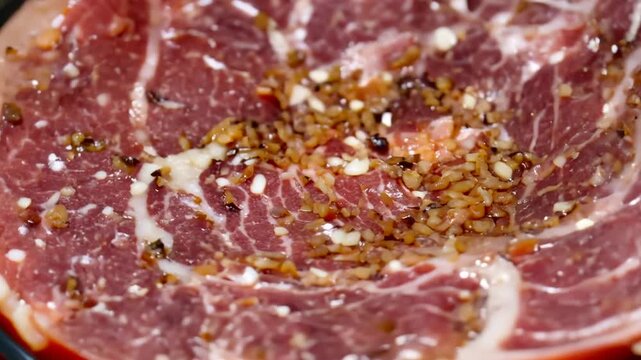 Close-Up of Sliced Cured Meat with Spices and Seasoning.
