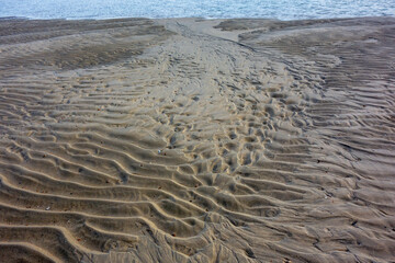 Background from wave patterns on the beach
