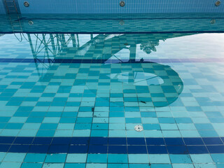 The pool is dirty, the empty dry pool is getting ready to be filled.