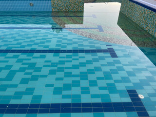 The pool is dirty, the empty dry pool is getting ready to be filled.