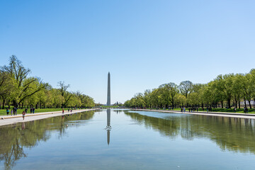 WASHINGTON, D.C. - April 10, 2023 : View of Washington Monument from the Lincoln Memorial in Washington, D.C. full of people during spring