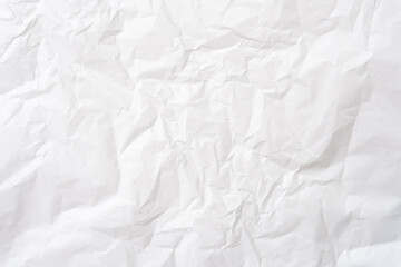 Top view of wrinkled or crumpled white stencil or tissue paper used for crumpled paper background texture.