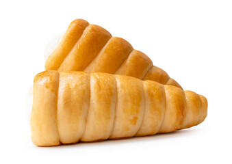 Side view of puff pastry cream horns in stack isolated on white background with clipping path