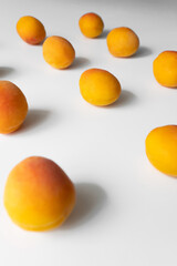 Fresh Apricots Neatly Arranged on White Background