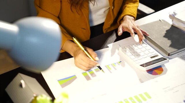 Business women  in the night office working overtime are stressed by overwork and worrying about deadlines.