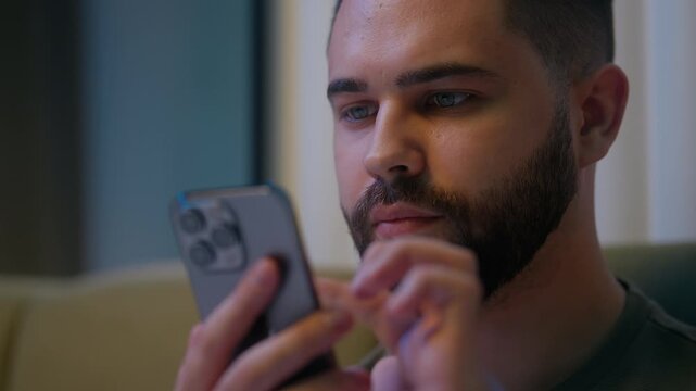 Caucasian man mobile phone user smartphone cellphone social networks online internet web browser scrolling communicate distance addiction connection insomnia technology video wireless message chatting