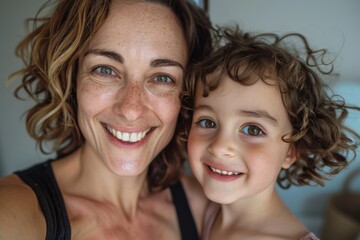 Fototapeta premium Ballet teacher, girl, woman, and joyful studio student posing. Creative arts, dance, and child development. Kid-friendly dance class supports, learns, and diversifies