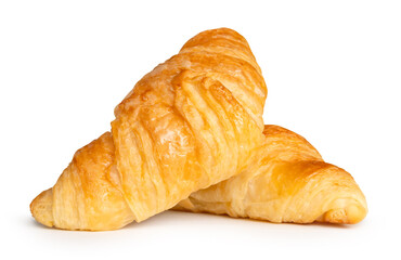 Side view of golden croissants in stack isolated on white background with clipping path