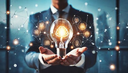 businessman holding light bulb