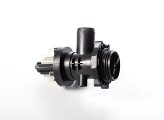 Washing machine drain pump on a white background, isolate, close-up.