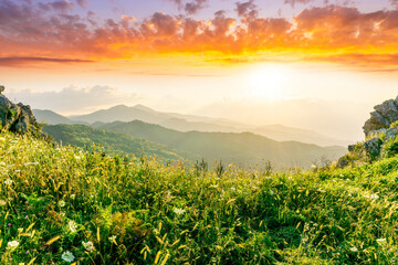 sceniv view from a top of a rocky mountain to amazing highland landscape with valley, peaks of...