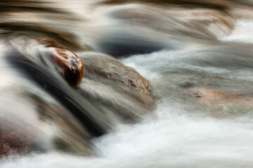 The peacefully swift flowing Big Thompson River within Estes Park, Colorado