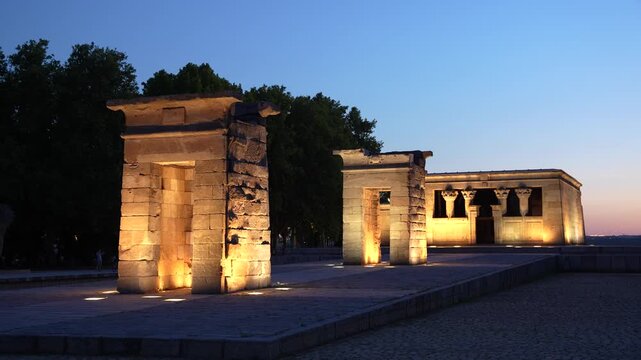 The Egyptian Debod Temple (Templo de Debod) in Madrid, Spain at Sunset. Lit Up. Monument in Europe. Tourist Destination Ancient Famous Landmark at Dusk
