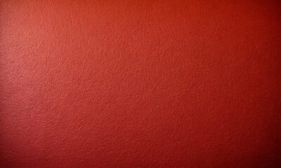 Fototapeta premium close-up of a red wall with a textured surface.