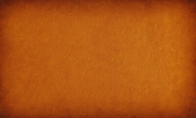 Fototapeta premium close-up of a textured orange background with a slightly blurred effect.