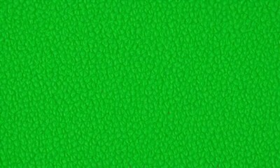 Fototapeta premium close-up of a green surface with a textured pattern.