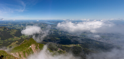 Mountain landscape partially in the clouds, view from Pilatus mountain peak, Lucerne