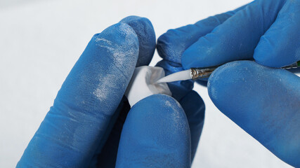 dental technician prepares a zircon crown