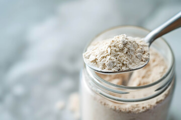 Probiotic supplement bottle with a spoon, showcasing the powder, yogurt provides nutritional value and adds probiotics that are necessary for the body, improves the intestinal system and excretion