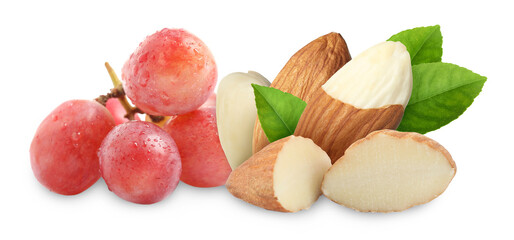 Almonds and pink grapes isolated on white
