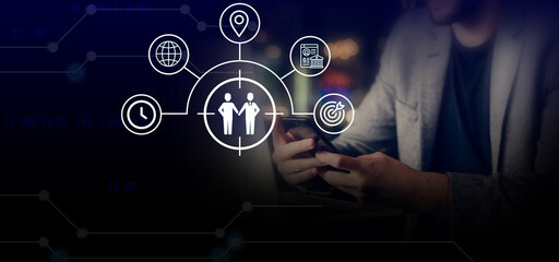 A businessman presents a global partnership concept, showcasing interconnected icons and strategies for business collaboration.