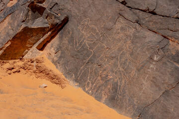 rock painting in desert, Bouhadian rocks in Tadrart Rouge, Tassili N'Ajjer National Park. Sahara