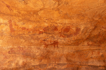 rock painting in desert, Bouhadian rocks in Tadrart Rouge, Tassili N'Ajjer National Park. Sahara
