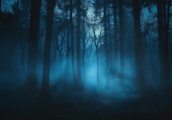 Naklejka premium A moonlit forest shrouded in mist with tall, dark trees and an eerie blue hue.