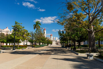 Park country in colonial vintage city of cienfuegos with trees and blue sky 
