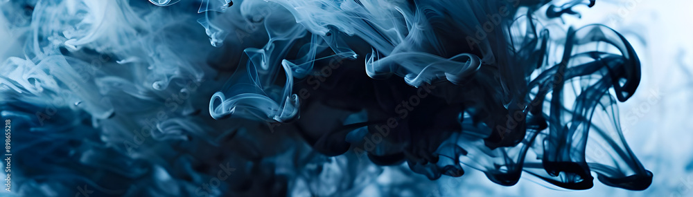 Poster Abstract image of blue ink swirling and diffusing in water, creating dynamic and fluid patterns against a light background.