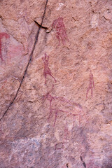 rock painting in desert, Bouhadian rocks in Tadrart Rouge, Tassili N'Ajjer National Park. Sahara