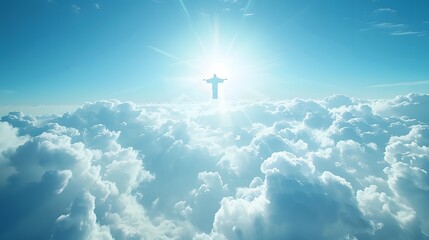 Fototapeta premium A breathtaking view of clouds with a luminous sun shining behind a towering statue, creating a serene and uplifting atmosphere. 