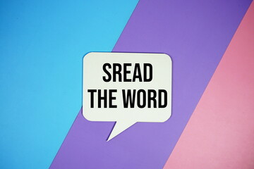 Spread The Word text on speech bubble top view on blue, purple and pink geometric background