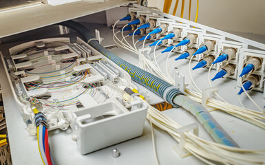 internal wiring of optical patch panel in wall cabinet for signal transmission via optical cables