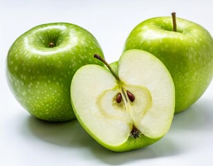 Two green apples and half of green apple on white background. File contains clipping path.