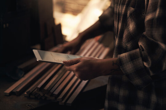 Metal, factory and hands of person with tablet for quality control, process management and monitor production. Foundry workshop, worker and online for technical documentation and inventory tracking.