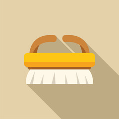 Cleaning brush with wooden handle lying on beige background with long shadow