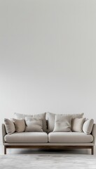 A neutral beige sofa with wooden legs sits in a minimalist interior design setting, featuring a plain white wall and a simple rug. Generative AI