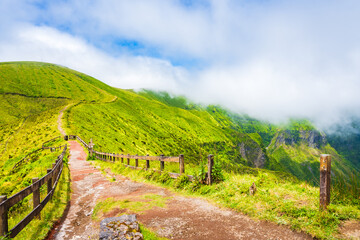 Path along volcano crater green valley caldera, Faial island, Azores, Portugal