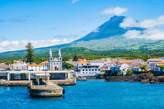View of Madalena port and volcano on coast of Pico island, Azores, Portugal
