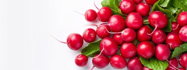  A collection of red radishes with emerald-hued greens crowning them, atop a pristine white background, featuring water droplets gracefully adorning each rad