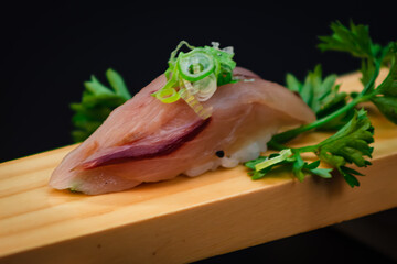 Sea bream sushi with black background