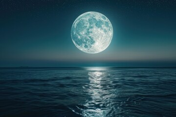 big glowing moon over the sea at night