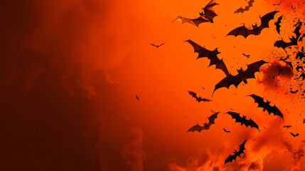 Fototapeta premium Flock of bats flying in a spooky orange sky, perfect for halloween projects