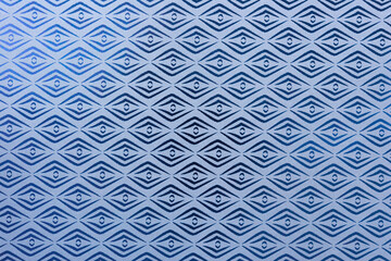 scrapbooking paper background featuring diamond squares in metallic blue foil and mat gray