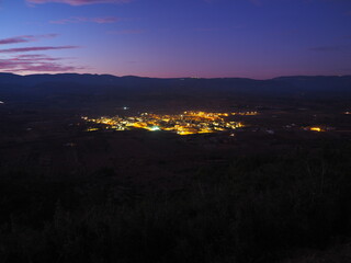 Adzaneta del Maestre, a village in El Maestrazgo, in the Province of Castellón, Spain, illuminated at night, from the mountains of El Bovalar © Búho