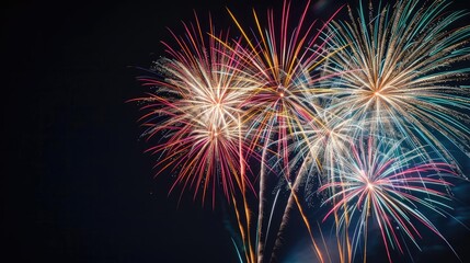 Fireworks with radiant colors on a black background, Celebration, vibrant night sky festivity