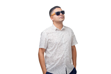 Man on vacation with sunglasses and smartphone. Interacting with cell phone. Device with blank space for mockup. Vacation concept.